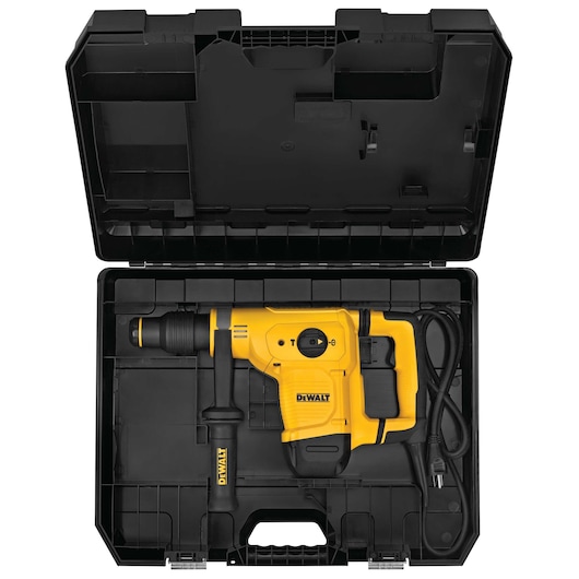 A yellow DEWALT rotary hammer drill with a black handle and cord, placed inside a hard black carrying case with compartments.