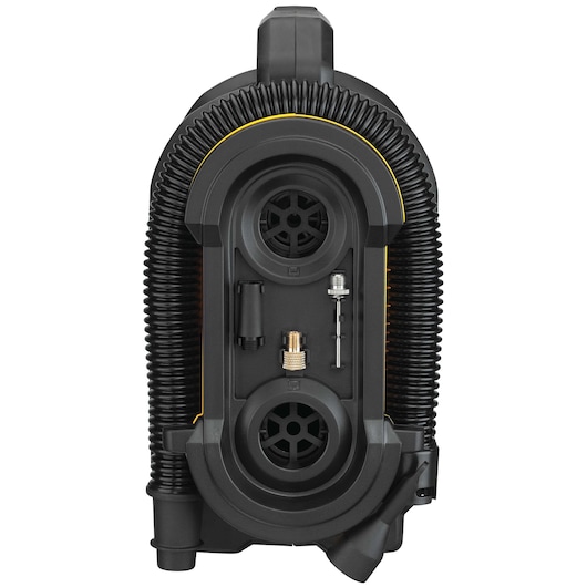 Close-up view of the back of a DEWALT portable air compressor, showing hose storage and various nozzle attachments.