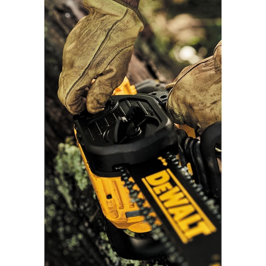 Close up of Tool-free chain tensioning and bar tightening knob feature of  XR® Compact 12  inch Cordless Chainsaw