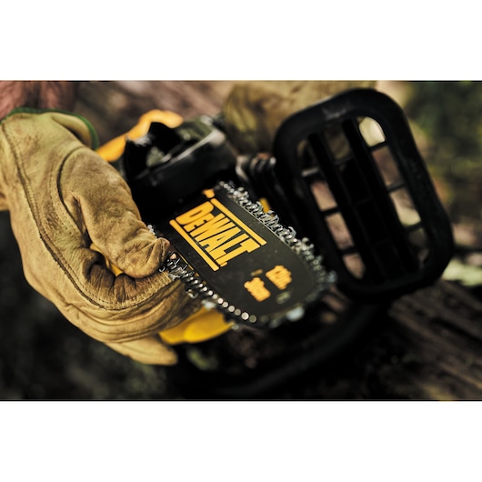 Close up featuring 12 inch OREGON BAR AND CHAIN of XR® Compact 12 inch Cordless Chainsaw