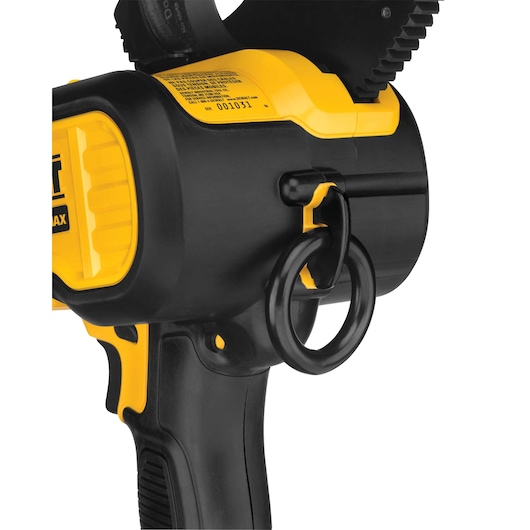 Close-up of a DEWALT power tool with a yellow and black design, featuring a prominent handle and a metal ring attachment.