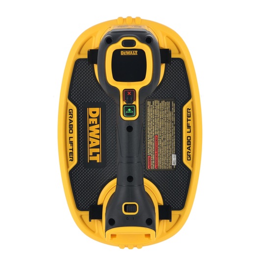 A DEWALT-branded Grabo lifter tool, featuring a black and yellow color scheme. The handle has two buttons, one with an 'X' and one with a green icon, and instructions are displayed on its surface.