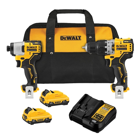 A DEWALT tool kit including a yellow and black carrying bag, a cordless impact driver, a cordless drill, two rechargeable 12V battery packs, and a battery charger.