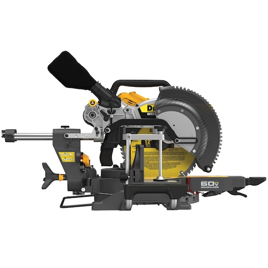 A DEWALT 60V brushless cordless double bevel sliding compound miter saw, model DCS781B, featuring a large circular blade, miter scale, and dust collection bag. The saw is mostly gray and yellow with black accents.