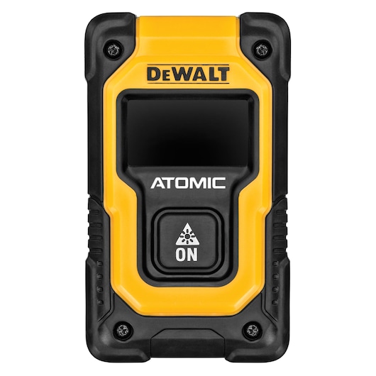 Front view of a DEWALT ATOMIC laser measuring device featuring a yellow and black casing, a display screen, and an ON button with a laser warning symbol.