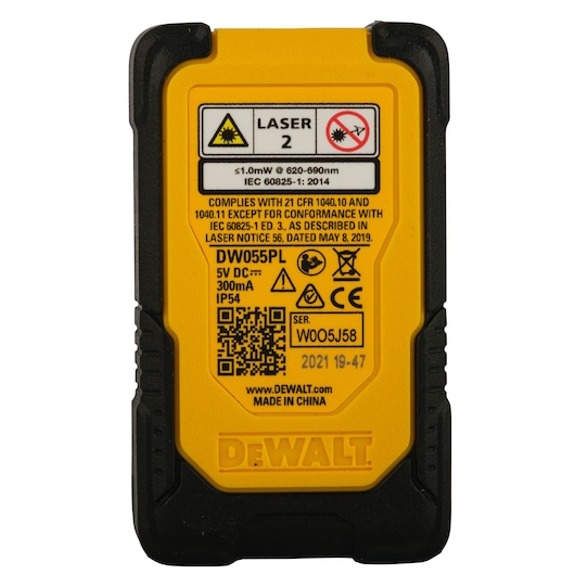 Back view of a DEWALT DW055PL laser measuring tool, showing warning labels, technical specifications, QR code, and serial number on a yellow and black casing.