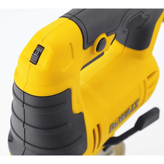 Close-up view of the handle and dial of a yellow and black DEWALT power tool, showing the number 9 on the adjustment dial.