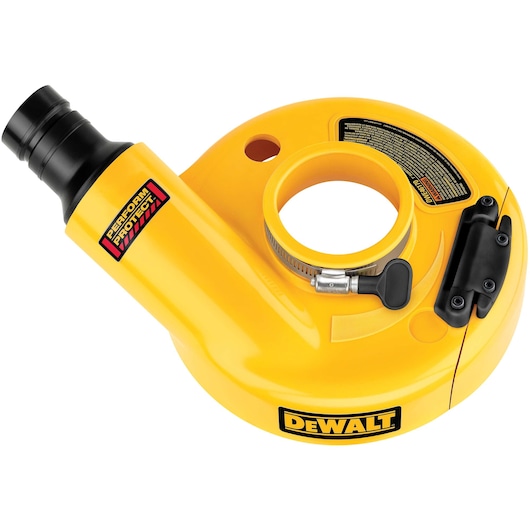 A yellow DEWALT Perform & Protect dust shroud attachment designed for use with angle grinders. The shroud features a central circular opening, clamp, and an exhaust port for dust extraction. The DEWALT logo and safety information labels are visible.