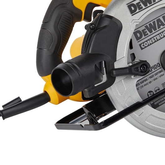 Close-up view of a DEWALT DWE5615 circular saw, showing the handle, power cord, dust extraction port, and part of the blade guard.
