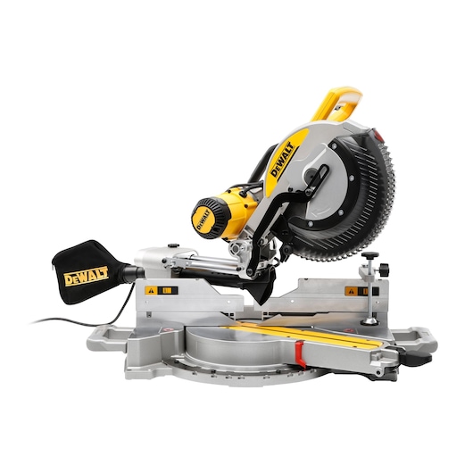 A DEWALT DWS780 sliding compound miter saw with a dust collection bag attached, shown at a side angle against a white background.