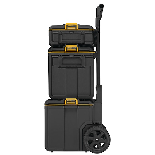 Stacked black DEWALT ToughSystem toolboxes with yellow accents, mounted on a wheeled cart.