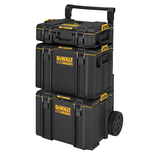 A DEWALT ToughSystem 2.0 modular tool storage system, featuring three stacked black plastic toolboxes with yellow accents and secure latches. The unit has wheels and a telescopic handle for easy transport.
